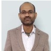 DR. DHANJI PRASAD